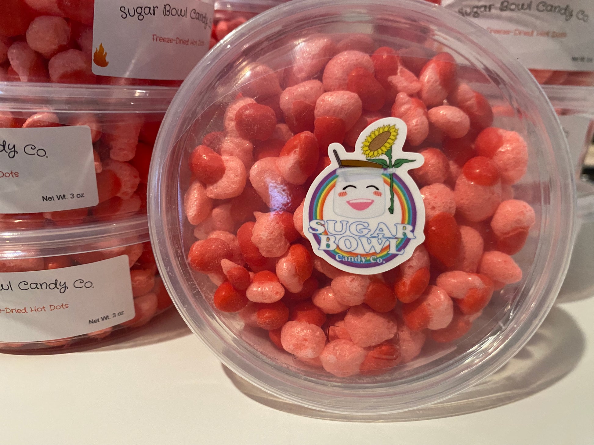 Containers of freeze-dried cinnamon candies.